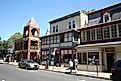 Doylestown Pennsylvania 06-23-2007 East State Street. Row of older houses with expanded fronts for shops. Editorial credit: Plant Wizard / Shutterstock.com