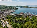 Aerial view of the Mccaig's Tower and Battery Hill in Oban, Scotland.