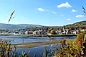 Town of La Malbaie in Quebec, with buildings set against a forested hillside