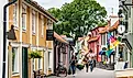 Traditional wooden houses on Stora Gatan street in heart of Sigtuna, Sweden. Editorial credit: Andrei Nekrassov / Shutterstock.com