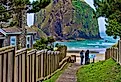 Public beach access path at Cannon Beach, Oregon, with the stunning coastline and Haystack Rock.