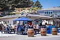 People eating at Spud Point Crab Co. in Bodega Bay, California, via Brycia James / Shutterstock.com