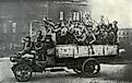 Truckload of excited soldiers during Russian Revolution. St. Petersburg, 1917.