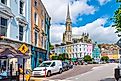 A colorful main street in Cobh, Ireland. Image Credits: Kirk Fisher via Shutterstock