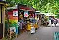 The original Kuranda Rainforest Market is a folk art and food market located in the rainforest village of Kuranda near Cairns in Far North Queensland, Australia.