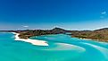 Editorial Photo Credit: GagliardiPhotography via Shutterstock. Hill Inlet Lookout. Whitehaven Beach in the Whitsundays, Queensland panoramic aerial view, Australia