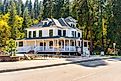 Exterior view of the Museum of North Idaho, located at the historic 1903 JC White House, in the lakefront downtown of Coeur d'Alene, North Idaho Panhandle. By Kirk Fisher / Shutterstock.com