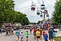 People attend the Iowa State Fair in Des Moines, Iowa. Image credit: David Papazian / Shutterstock.com.