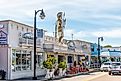 People walking around in the historical downtown of Tarpon Springs, Florida. Image credit Microfile.org via Shutterstock.com