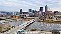 Cedar River in Cedar Rapids, Iowa, on a clear day.