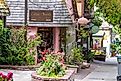Carmel by the Sea, California, United States 07.11.2011:  Quaint ivy covered shops in Carmel by the sea, city on the Pacific coast known for its enchanting architecture.. Image credit: J Wendy Baker via Shutterstock