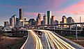 Houston, Texas, USA downtown skyline over the highways at dusk.
