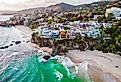 Aerial view of luxury buildings at the coast of Laguna Beach, California.