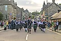 Pipe Band marching down Pitlochry High Street for the Highland Night. Image credit: Alan M. Walker / Shutterstock.com