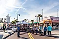 Tourist and locals shopping at the historic beach downtown of Tarpon Springs. Editorial credit: Microfile.org / Shutterstock.com