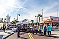 Tourist and locals shopping at the historic beach downtown of Tarpon Springs. Editorial credit: Microfile.org / Shutterstock.com