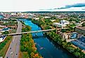 Aerial drone photo of Downtown Manchester, New Hampshire during autumn. Image credit Loud Canvas Media via AdobeStock.