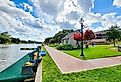The Beau Jardin and Riverwalk in downtown Natchitoches. Editorial credit: VioletSkyAdventures / Shutterstock.com
