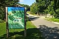 A Welcome to Lanesboro sign along the Root River Trail in Lanesboro, Minnesota. Editorial credit: Dave Jonasen / Shutterstock.com.
