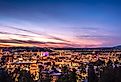 Panoramic view of Spokane, Washington's skyline at dusk.