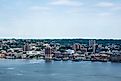 Wide view of the skyline of Yonkers with the Hudson River in the foreground. Editorial credit: Brian Logan Photography / Shutterstock.com