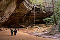 Tourists visit Ash Cave in Southeast Ohio at Hocking Hills State Park.. Image credit: Arthurgphotography / Shutterstock.com.