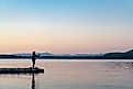 fishing from a log in Lake Tahoe, Nevada