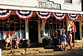 Neighbors catching up outside The Brewster Store on Cape Cod, Massachusetts. Editorial credit: James Kirkikis / Shutterstock.com