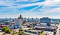 Aerial view of Beaumont, Texas, cityscape with modern and historic building.