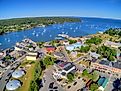 Boats along the coast of the Passagassawakeag River in Belfast, Maine.