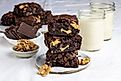 Sliced brownies with chopped walnuts