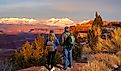 Canyonlands National Park at sunset against snow covered mountains. Utah, USA.