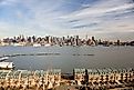 Town Houses with the Hudson River and midtown Manhattan in the background.