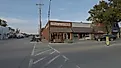 View of businesses lined along a street in Jenks, Oklahoma. Editorial credit: 4kclips / Shutterstock.com
