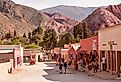 A street with souvenier shops in Purmamarca, Argentina. Image credit Angelo DAmico via Shutterstock.com