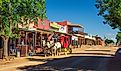 Historic Allen street with a horse drawn stagecoach in Tombstone. Editorial credit: Nick Fox / Shutterstock.com