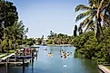  Kayakers floating in a canal on Anna Maria Island, Florida.