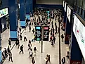 a bustling MTR (Mass Transit Railway) station in the Tai Wai area of Hong Kong. 