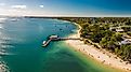 Aerial view of Bongaree Jetty on Bribie Island, Sunshine Coast, Queensland, Australia.