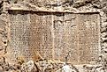 A large cuneiform inscription on the Van Castle hill, west of modern-day Van, in eastern Turkey. Image credit Bjørn Christian Tørrissen, CC BY-SA 3.0 <https://creativecommons.org/licenses/by-sa/3.0>, via Wikimedia Commons