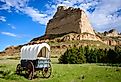 Scotts Bluff National Monument in Nebraska with a wagon.