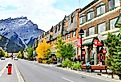 Banff Avenue in Banff, Alberta. Image credit viewfinder via Shutterstock