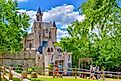 People visiting the enchanting fairytale castle in Waxahachie during the Scarborough Renaissance Festival. Editorial credit: Grossinger / Shutterstock.com