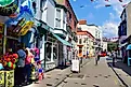 Tenby, Pembrokeshire, Wales. The view of St George's Street taken from just inside the Arches gateway.