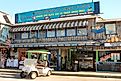 Shops and restaurants along the Gulf of Mexico waterfront in Cedar Key, Florida. Editorial credit: Leigh Trail / Shutterstock.com