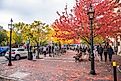 A small brick square along Pleasant Street in downtown Portsmouth, New Hampshire. Editorial credit: Albert Pego / Shutterstock.com.