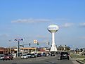 Late afternoon traffic with the giant water tank in Moore, Oklahoma. Editorial credit: RaksyBH / Shutterstock.com