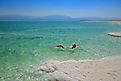 A woman floating in the Dead Sea.