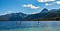 Paddle boarding on Redfish Lake in the Sawtooth Mountains in Idaho.