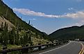 The Grand Loop Road in Yellowstone National Park is known as one of the first public use roads throughout a park. Credit: Helena Whitmore/ Shutterstock.com